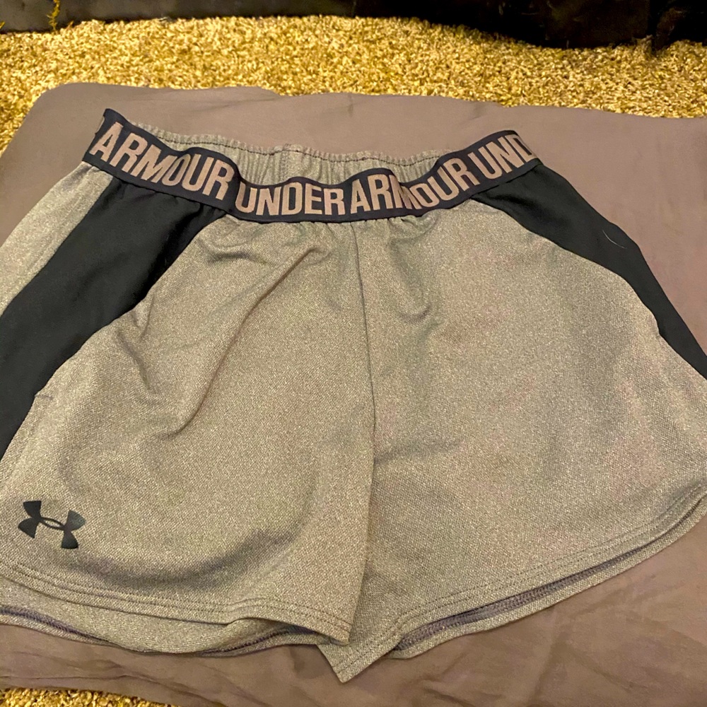 Gray and black , under armor shorts .Xs.Fit as a S